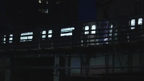 NYC Subway elevated train at night Stock Footage 129711114