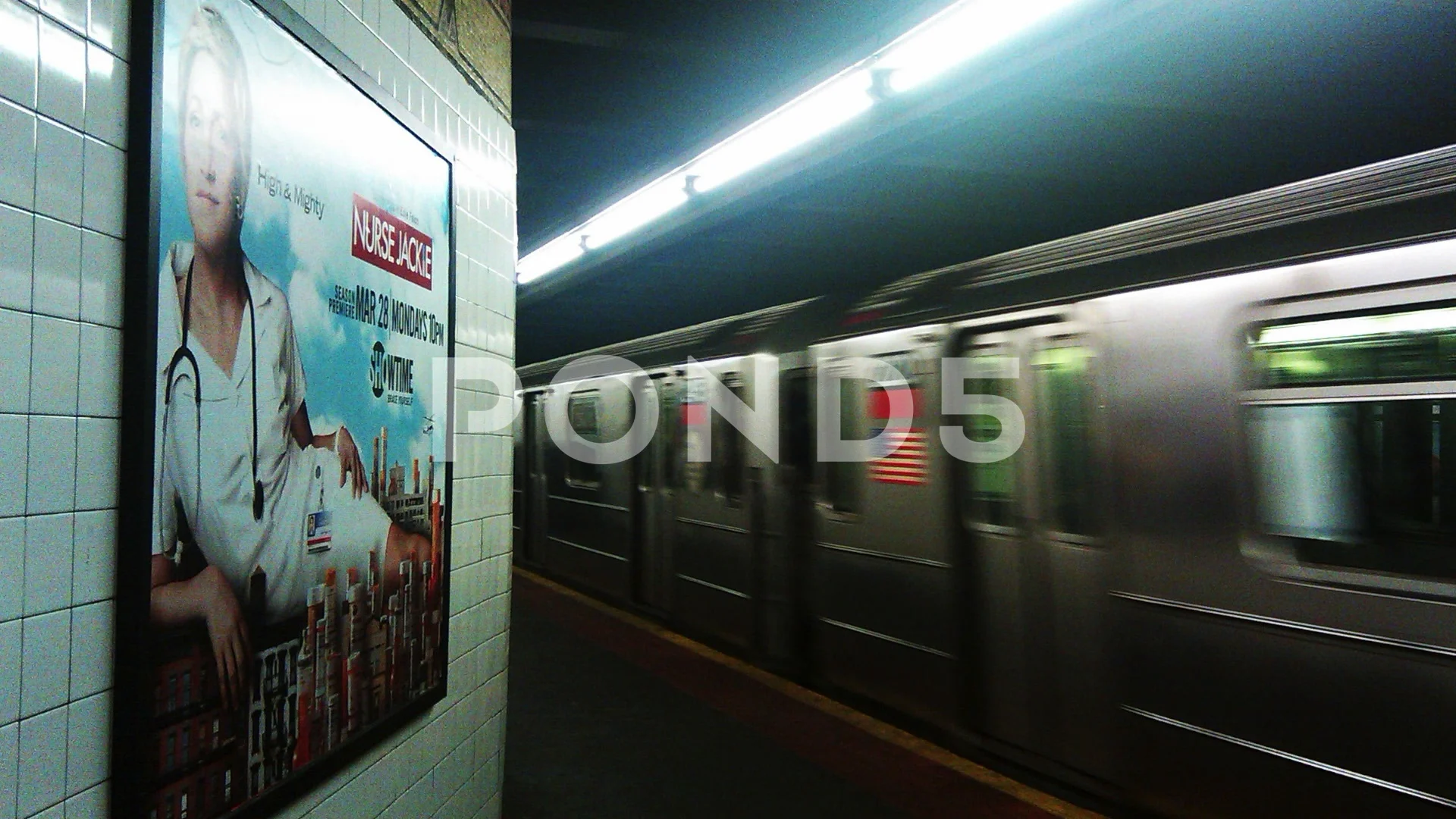 A Flushing line subway train in Times Square is wrapped in advertising  promoting the new time for reruns of the Seinfeld television program on  WPIX, seen on Sunday, May 18, 2014. The