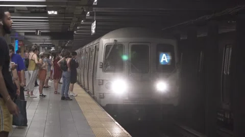 NYC subway train pulls into platform, waiting a train 4K 스톡 동영상 162908753