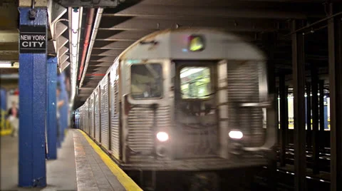 NYC Subway Train Pulls into Station - New York City Sign MTA Platform Stock Footage