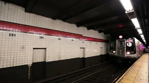 NYC Subway Train Rolls into Station Stock Footage 20615172