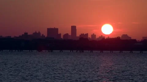 NYC Sunset plan flyby over marina water near laguardia airport 2 Stock Footage 46027970