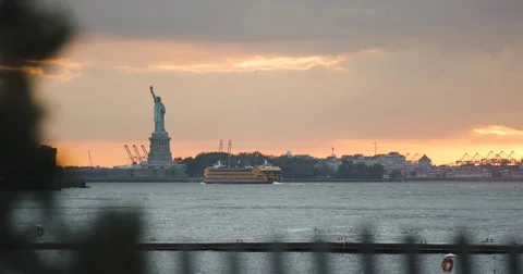 NYC's Statue of Liberty at sunset - 4k - summer 2016 Stock Footage 70221302