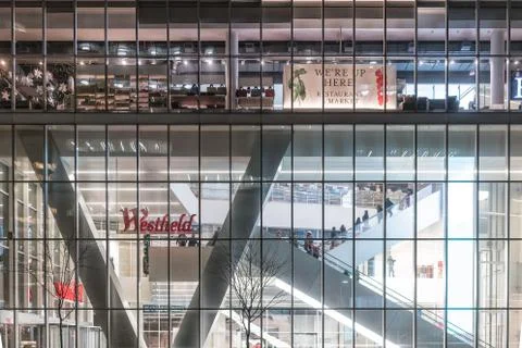 NYC/USA - 29 DEZ 2017 - Facade of shopping center with people on escalators.  Stock Photos