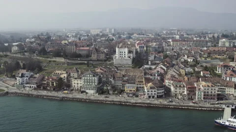 Nyon old town and lake Geneva by aerial view Stock Footage 61225341