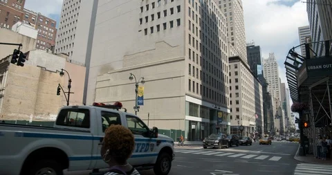 NYPD Driving the Wrong Way up 5th Avenue Stock Footage 114298069