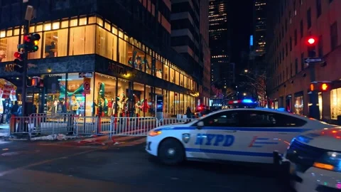 NYPD police car parked at intersection in New York at night Stock Footage 342332246