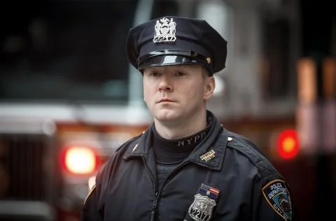 NYPD Police officer in NYC Stock Photos
