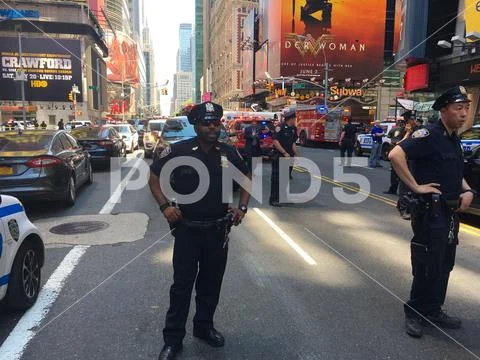 NYPD Police officers guard crime scene ~ Premium Photo #77389784