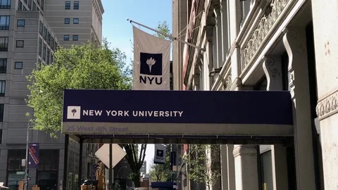 NYU flag over dorm building New York University in Manhattan NYC 4K 1080 HD 스톡 동영상 106221902