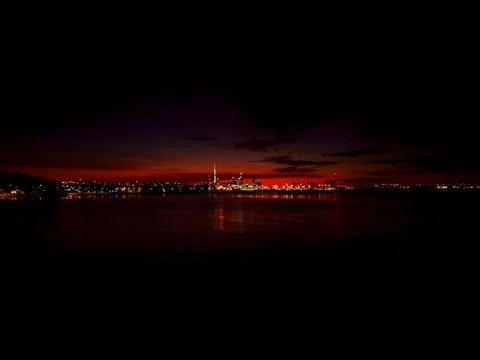 NZ landmark landscape quality photography on red sunset reflection on calm sea Stock Photos