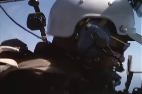 O-1F pilot look out side-windows and turn switch on radio - 1965 Stock Footage 103837392