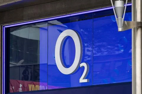 O2 Logo Displayed on Blue Screen in Liverpool, UK. Stock Photos
