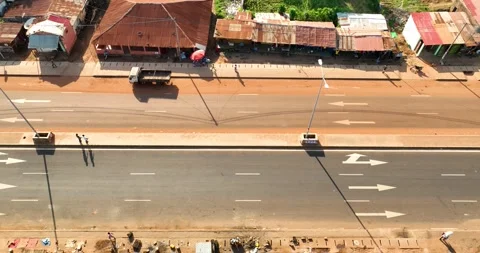 Oadside Rhythm Soft Traffic on a Sunny African Day Stock Footage 322788643