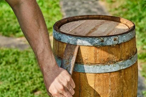 Oak Barrel. Opening the barrel with a chisel and hammer Stock Photos