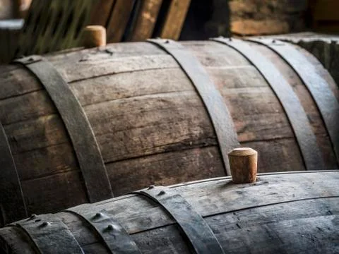 Oak barrels with wooden bungs (cork) in a cellar in the Kakheti wine region, Stock Photos