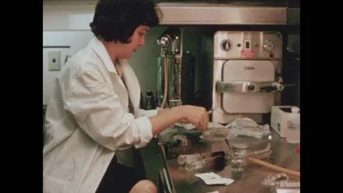 OAK RIDGE - 1964 - A scientist opens her materials for an experiment about Stock Footage 312872540