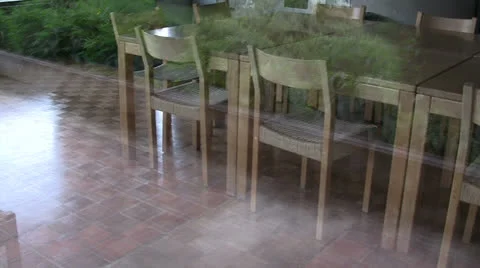 OAK TABLE AND CHAIRS THROUGH WINDOW PAN RIGHT Stock Footage 25102370
