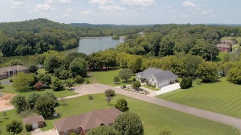 Oaklake Subdivision Flyover Spring Hill Tn, Lake Front Residential Housing Stock Footage 113975014