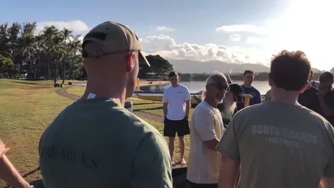 Oars being distributed for International Outrigger Canoeing competition Vídeo Stock 85346641