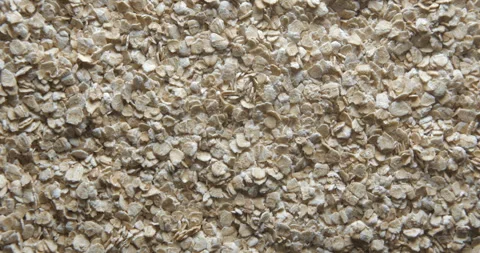 Oat flakes close up studio shot over rotating Stock Footage 324839545