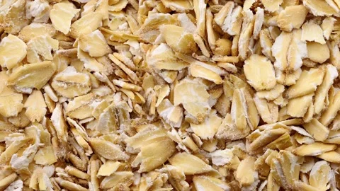 Oat flakes raw close-up 動画素材 166363617