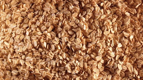 Oat Flakes, Rotating Background - Top View Stock Footage 194418073