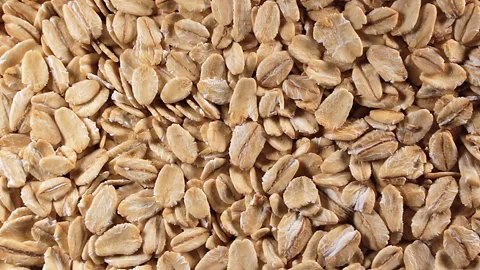 Oat Flakes, Rotating Background - Top View Stock Footage 245640379