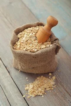 Oat flakes in sac Stock Photos