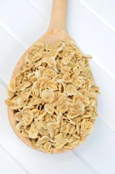 Oat flakes in spoon Foto stock