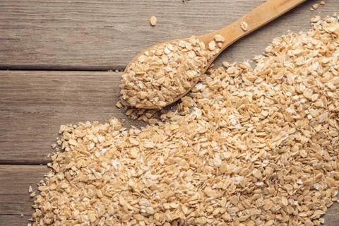 Oat flakes on the table Stock Photos
