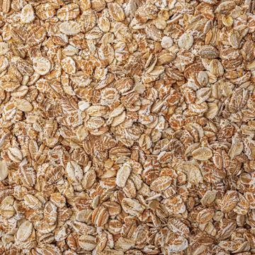 Oat flakes texture background, close up. Stock Photos