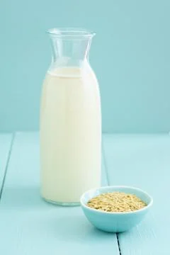 Oat milk in a bottle Stock Photos