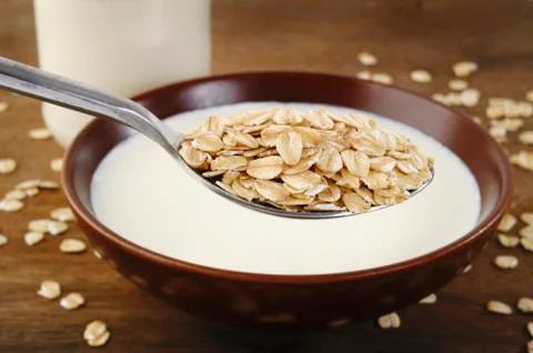 Oat in spoon Stock Photos