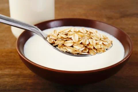 Oat in spoon Stock Photos