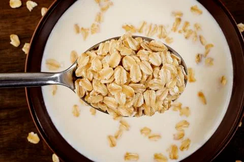 Oat in spoon Stock Photos