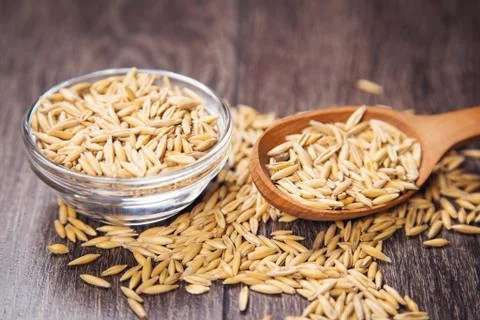 Oat in spoon Stock Photos