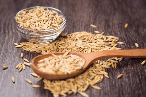 Oat in spoon Stock Photos