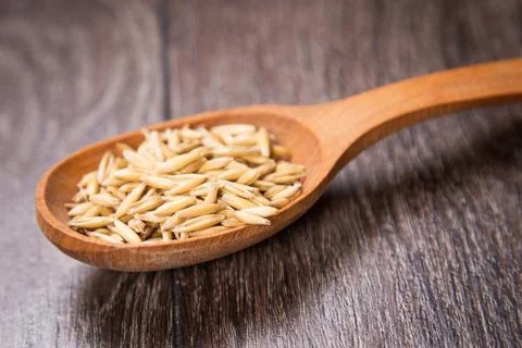 Oat in spoon Stock Photos