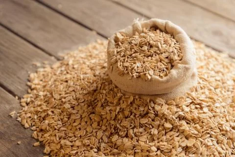 Oatmeal in a bag on a table Stock Photos