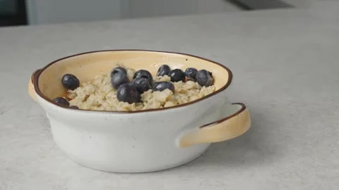 Oatmeal with blueberries Stock Footage 271616820