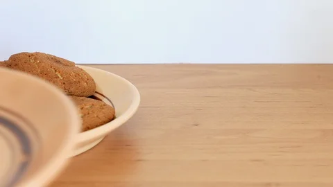 Oatmeal cookie and cup of coffee Stock Footage 88690487