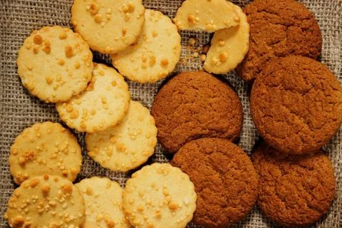 Oatmeal cookie on sackcloth Stock Photos