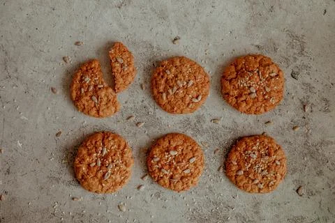 Oatmeal cookies on a gray pattern background Stock Photos