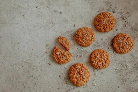 Oatmeal cookies on a gray pattern background Stock Photos