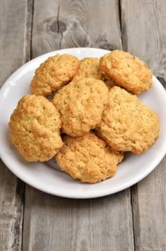Oatmeal cookies on rustic table Stock Photos