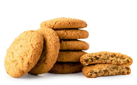 Oatmeal cookies stack and halves on a white, isolated. Stock Photos