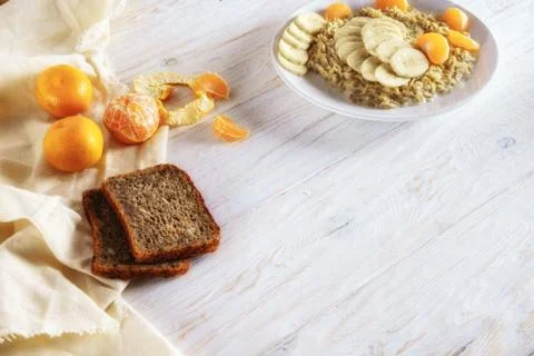 Oatmeal with fruit for breakfast Stock Photos