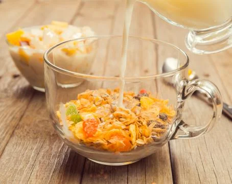Oatmeal with milk for breakfast Stock Photos