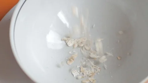 Oatmeal in plate Stock Footage 90627846